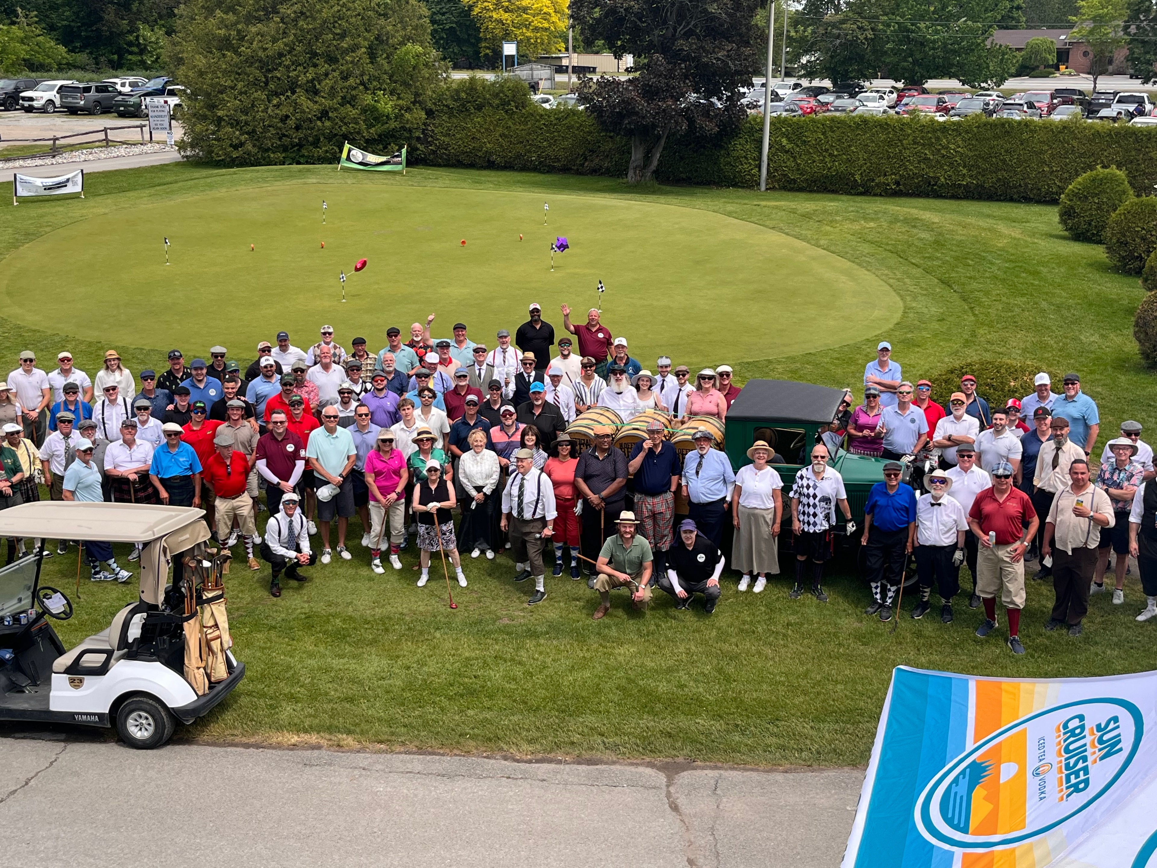 Over 100 participants in period attire gathered on the green at the Ottawa Hickory Golf Challenge